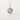 Necklace with a round pendant featuring characters from 'Sleeping Beauty' on a white background