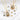 Gold necklaces with various charms on a white background